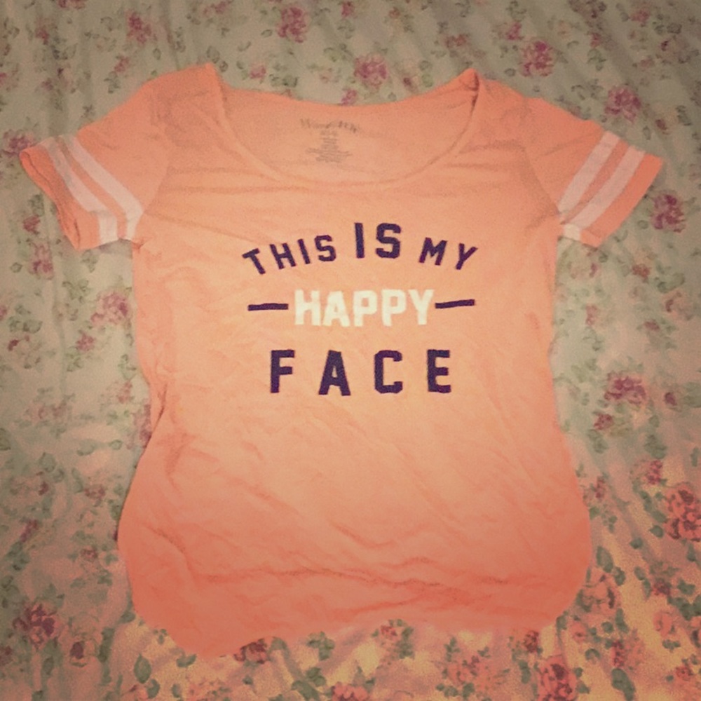 A pink shirt by wound up